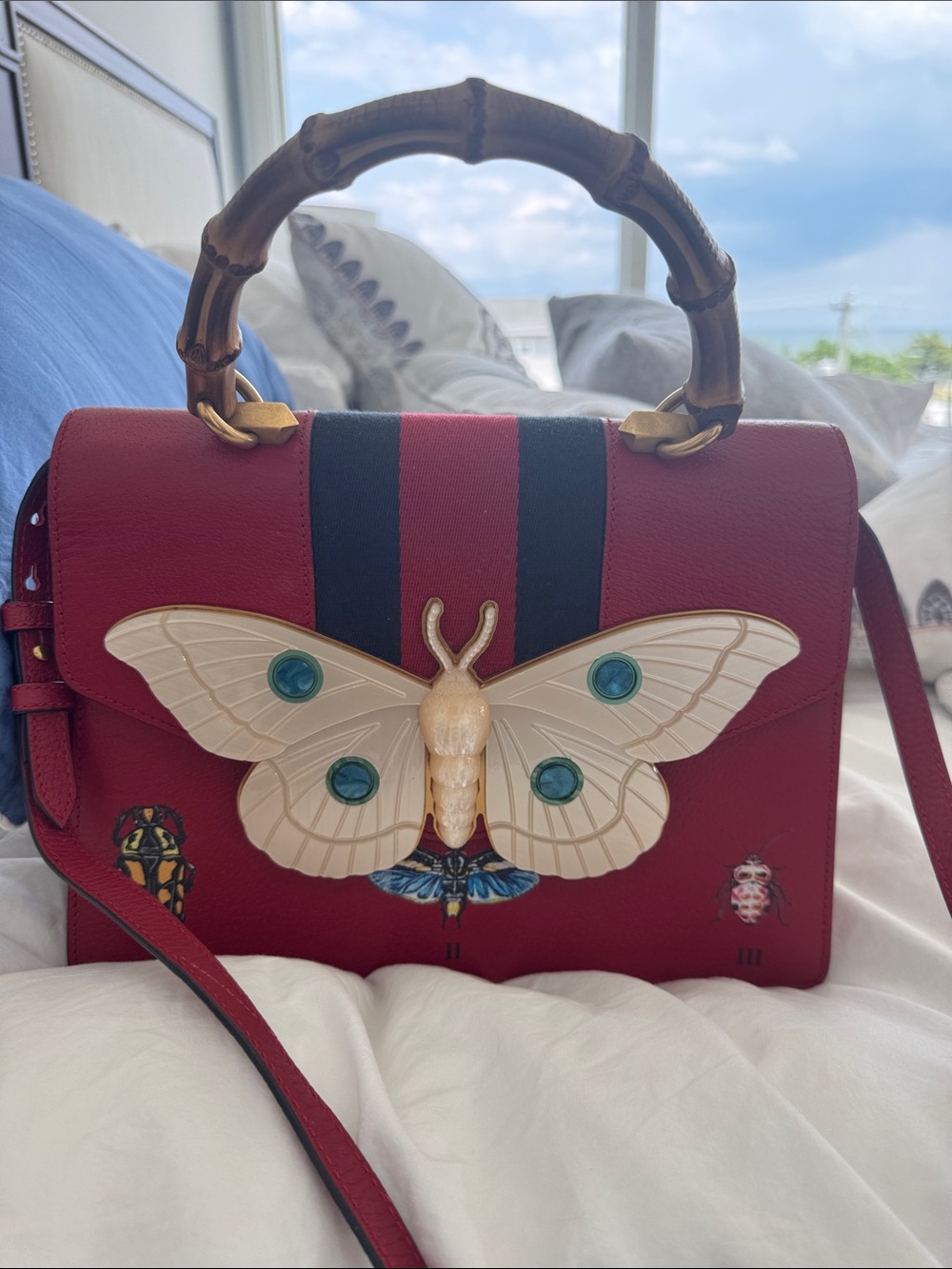 Gucci Falena shoulder bag in red calf leather with butterfly motif and bamboo